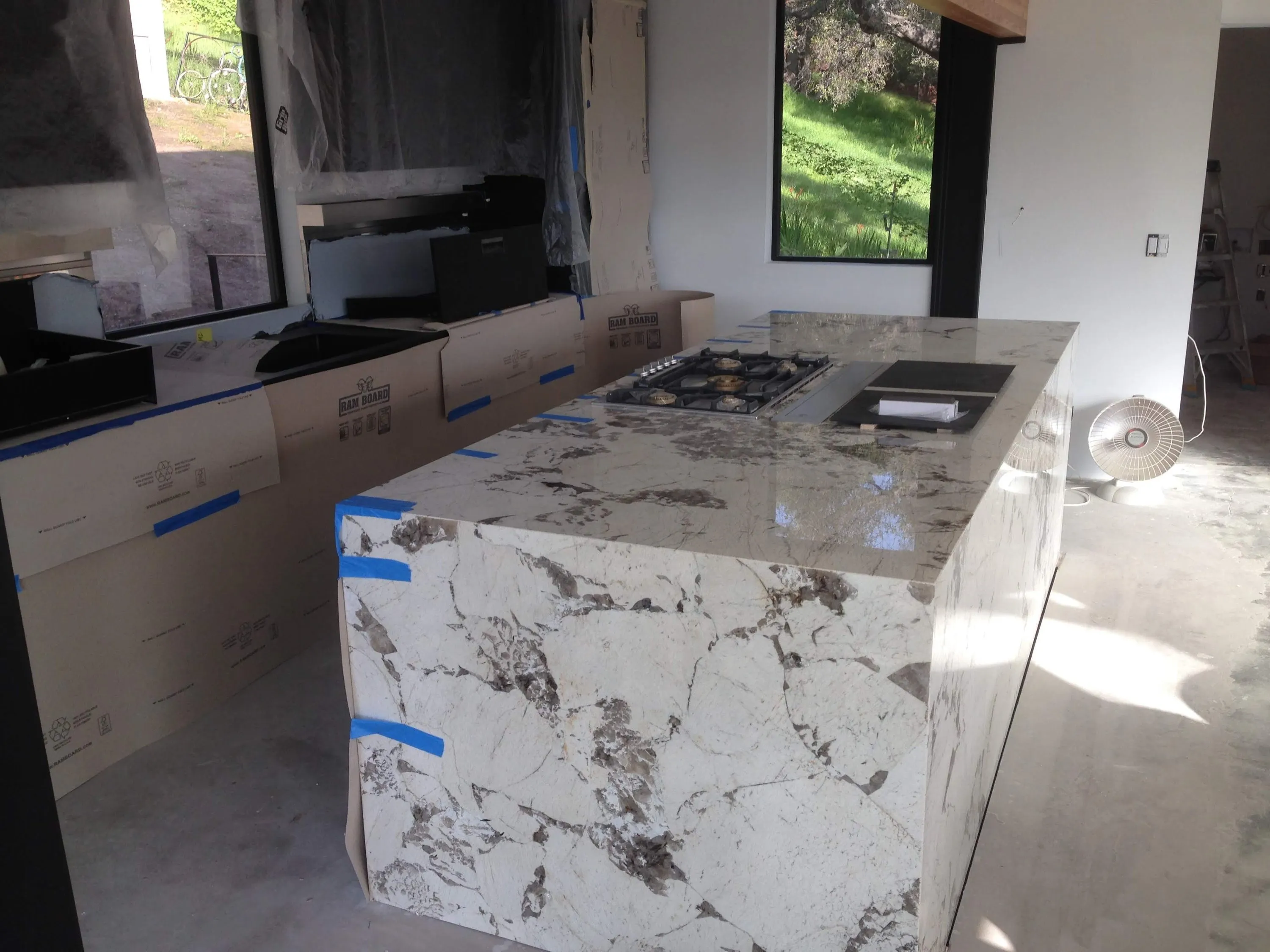 Stone waterfall island during installation