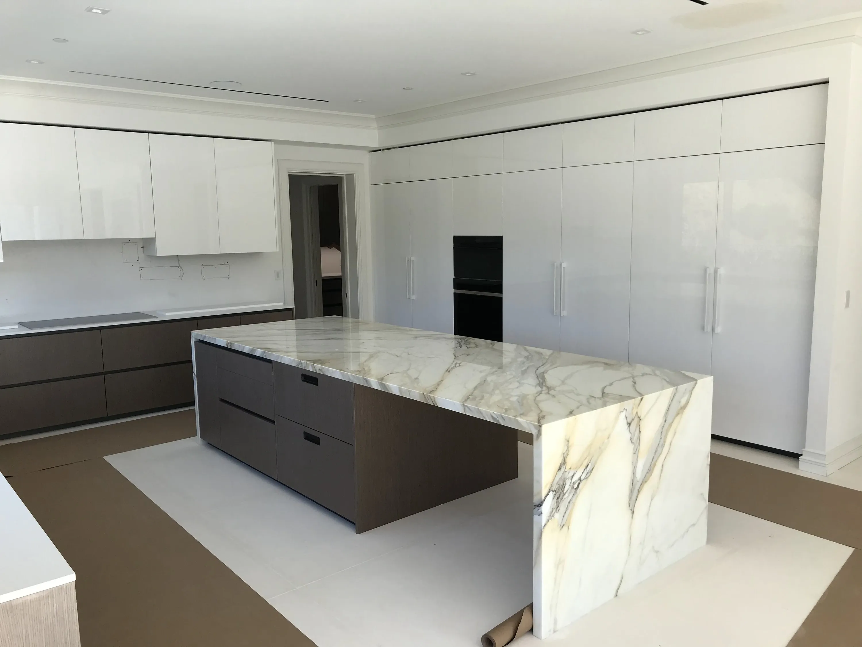 Marble waterfall island during installation