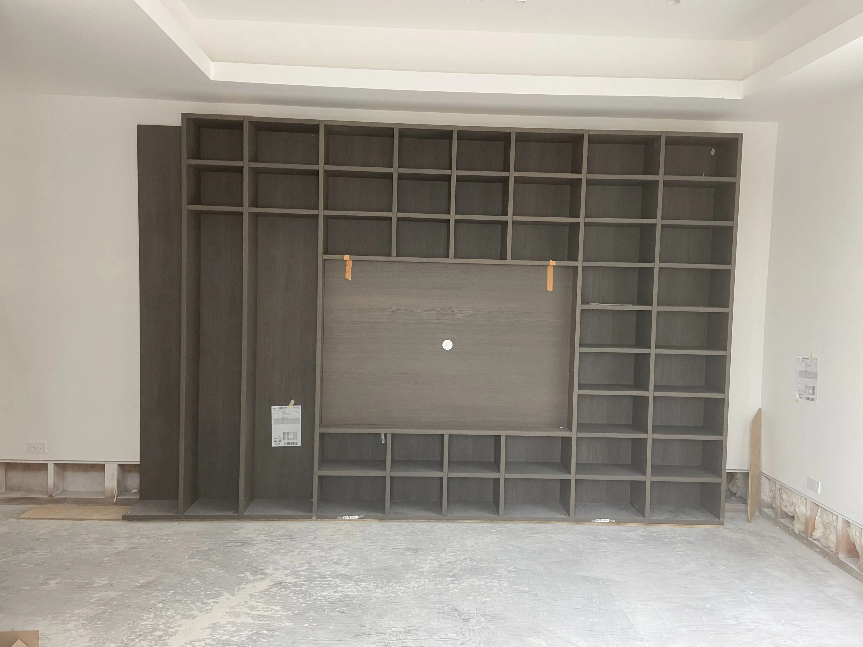 Built-in shelving wall before finishing