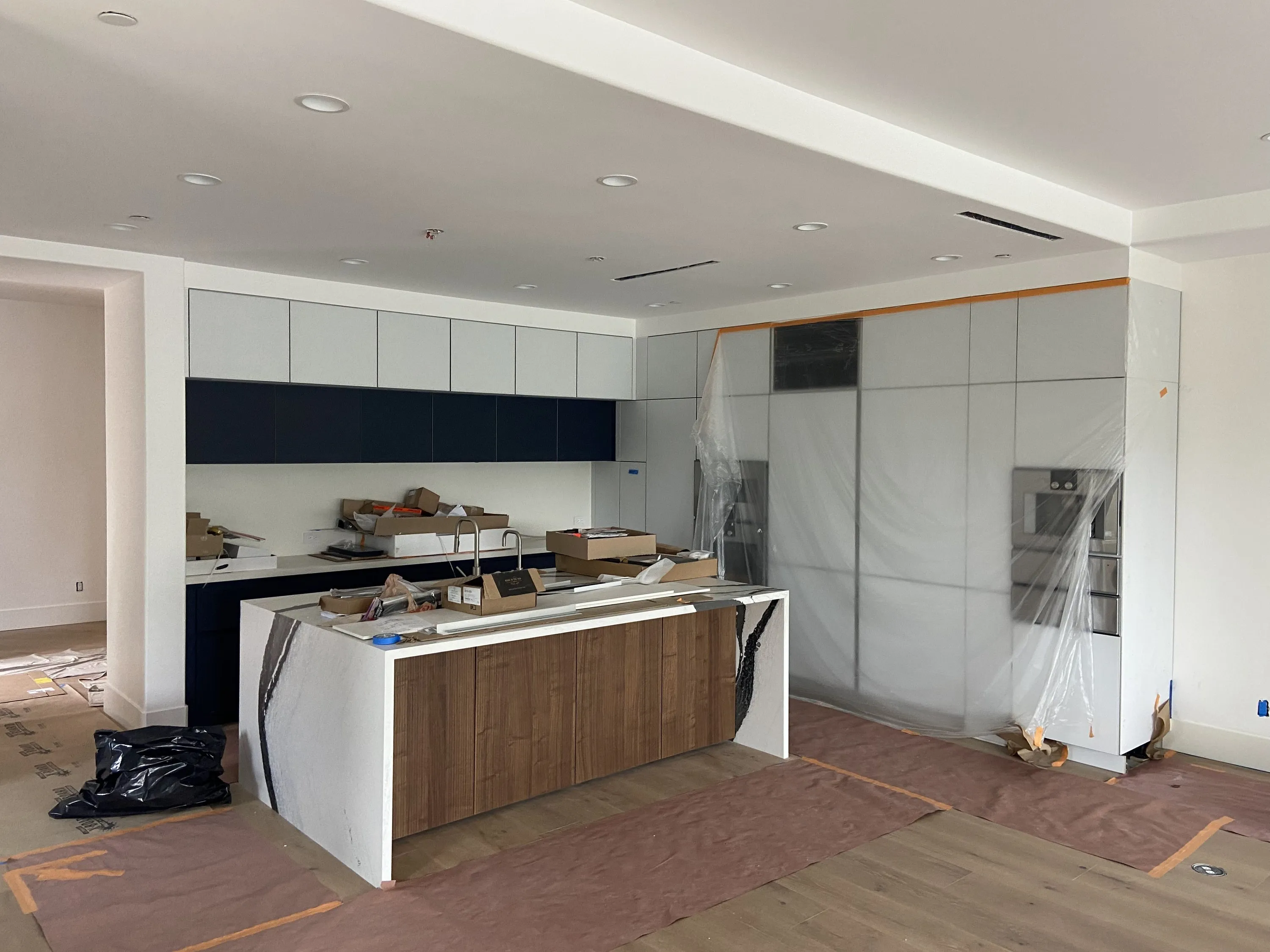 Kitchen island and cabinetry during installation
